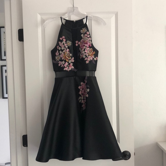 black dress with orange flowers